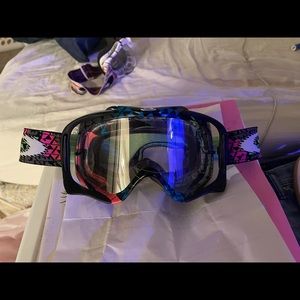 Women’s multi-color Oakley off-road riding goggles.